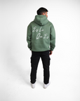 Es Lo Que Es - Olive Green Hoodie